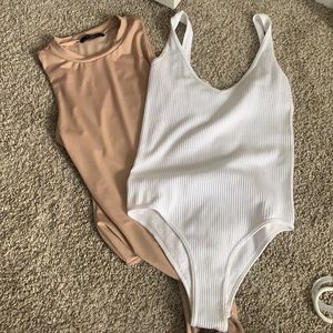 Nude and white bodysuits